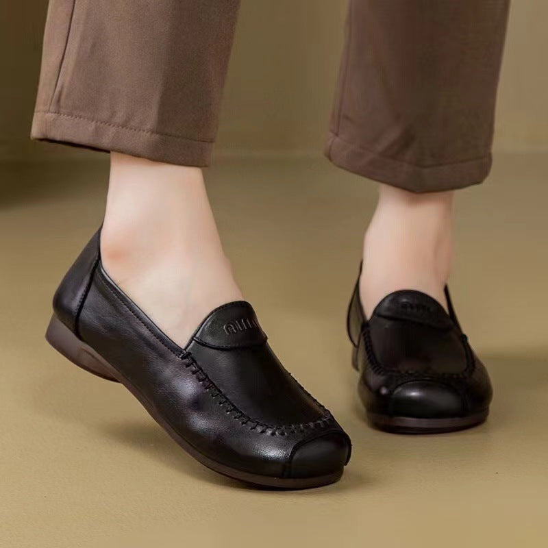 Zapatos de madre de piel de vaca con capa superior