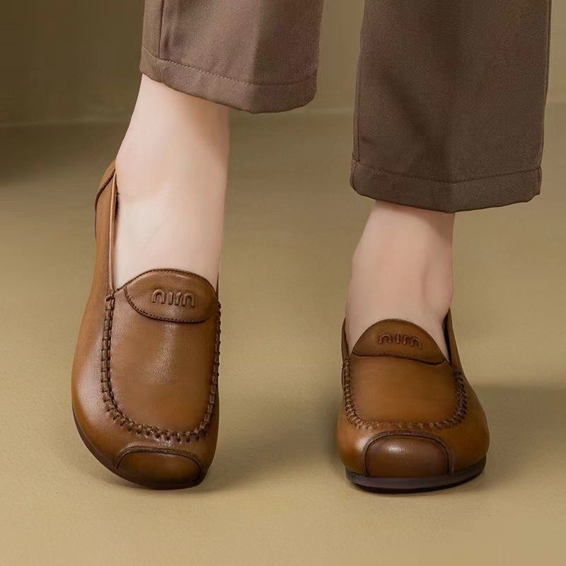 Zapatos de madre de piel de vaca con capa superior